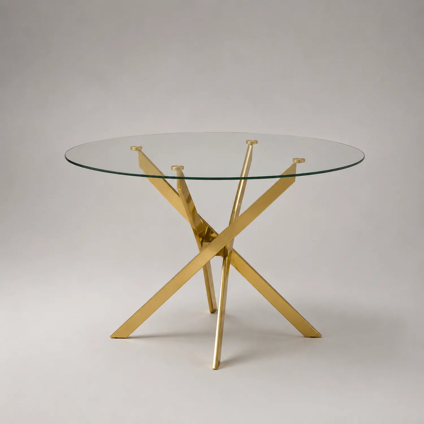 Runder Esstisch aus Glas und Metall, klar und golden